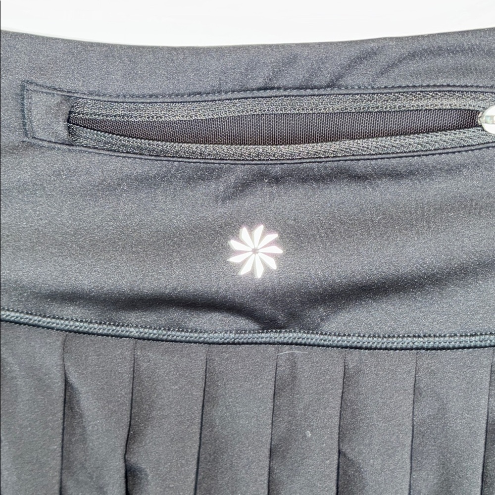 ATHLETA Black Pleated Mini Skirt with built in shorts. L - Picture 6 of 14